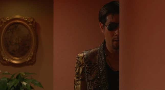 Majima peers around a corner. 