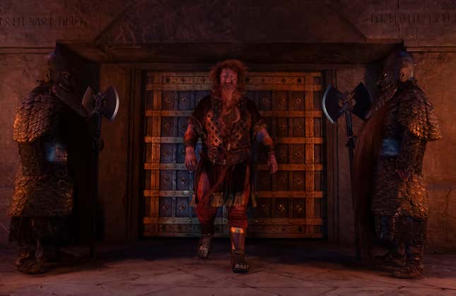 Durin walks past two guards.