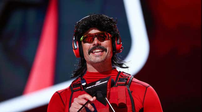 Dr Disrespect speaks on stage at the 2022 NFL Draft.